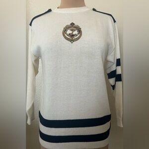 Elegant White Sweater with Embroidered Crest